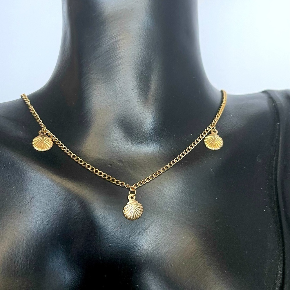 Gold tone minimalist seashell necklace